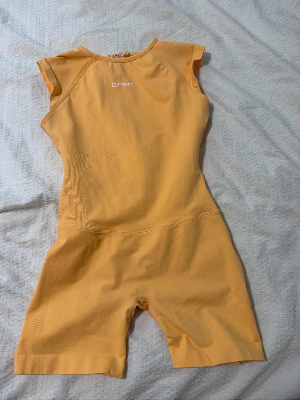 DFYNE jumpsuit, has a STAIN please look at pics